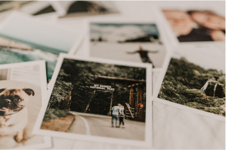 Authory homepage image of polaroid photos spread out on a table